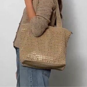 The Sak Tan Woven Tote bag with gold accents. Very nice NWOT no hang tag summer